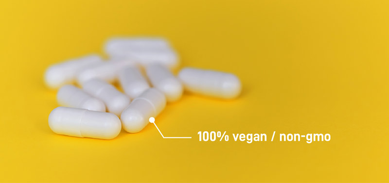 White manufactured NMN capsules show how they are vegan.