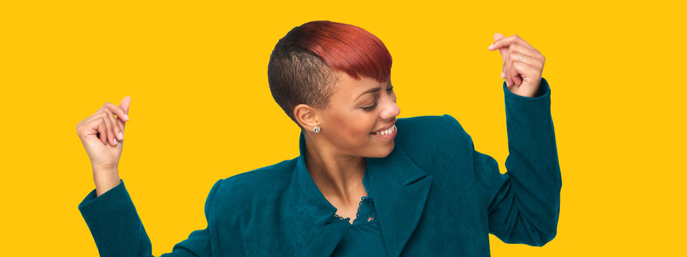 Smiling woman representing improved mood and mental energy supported by creatine during menopause