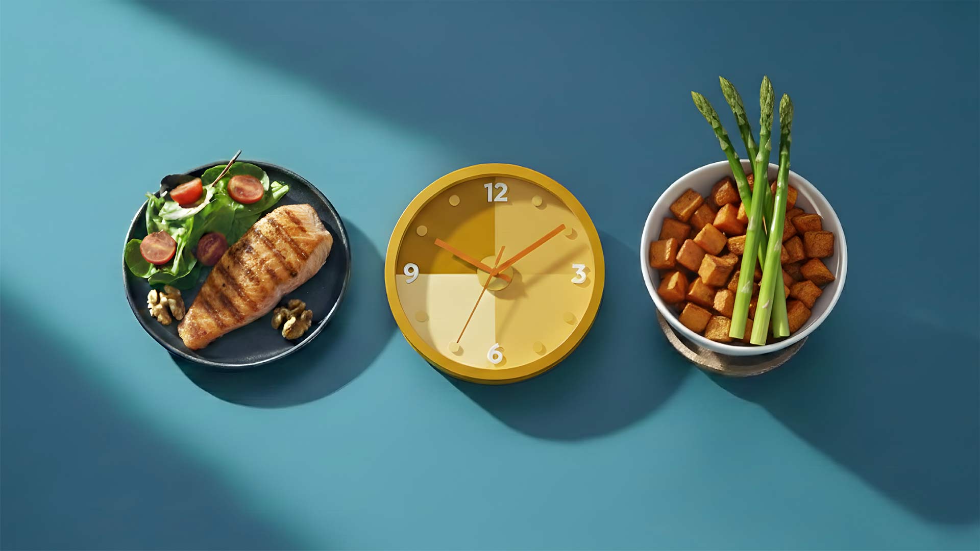 A plate of grilled chicken and salad, a yellow clock, and a bowl of asparagus and roasted vegetables arranged on a teal background.